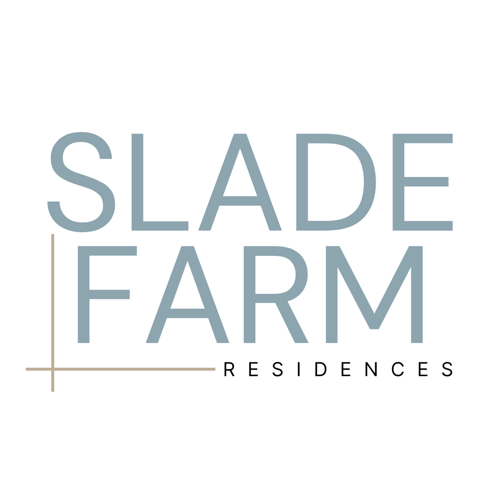 The image displays the words "SLADE FARM" in large, light blue letters on a black background.