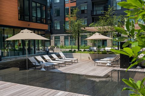 Courtyard Shaded Lounge Area at Arrowwood Apartments, Maryland, 20852