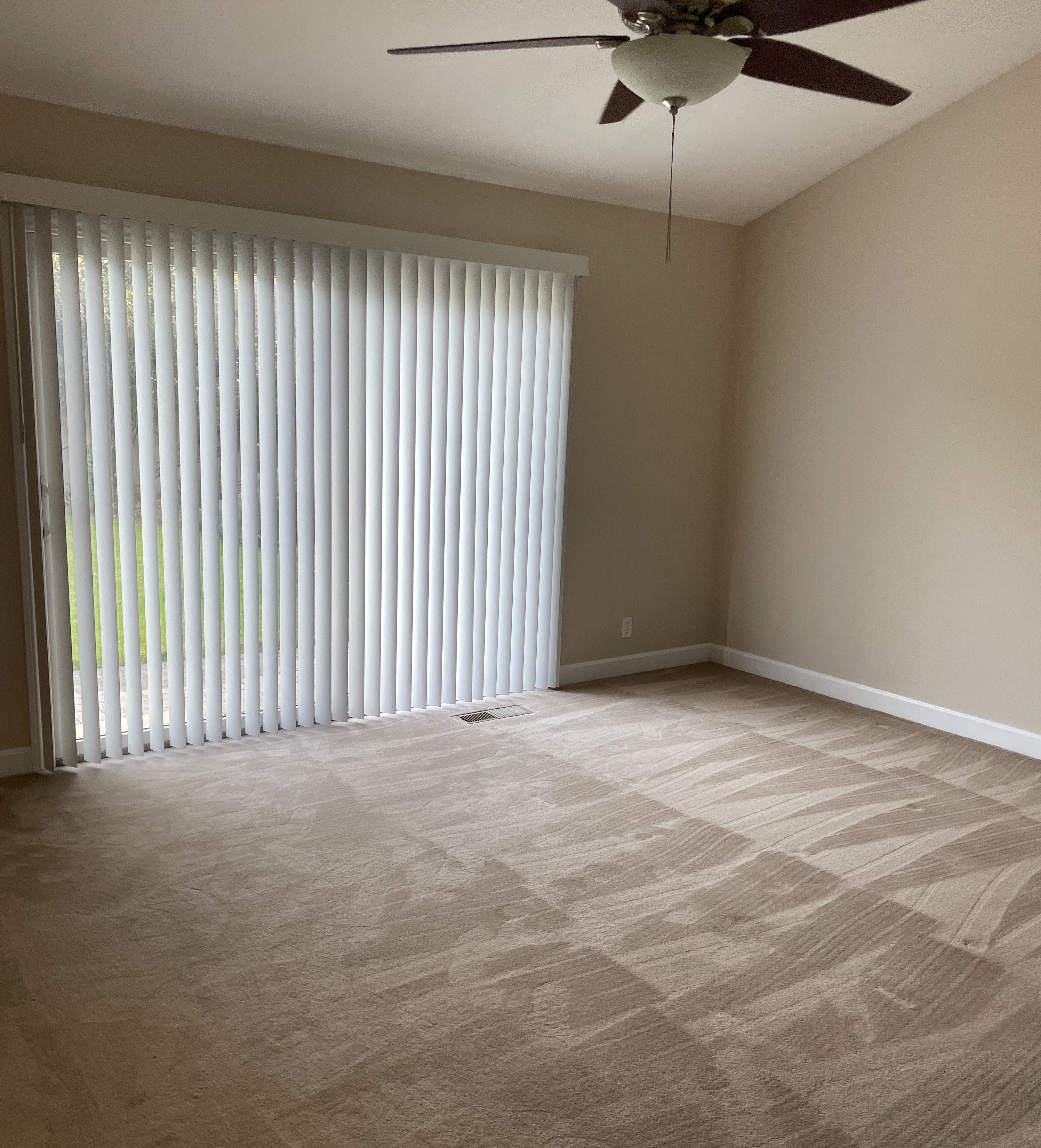 Brookings carpeted room patio sliding door