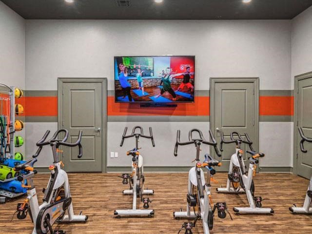 Fitness Center Open 24 Hours with Multiple Cardio Machines, Weight Training and Flat Screen TV to Enjoy during your Work Out at Cambridge Square Apartments, Overland Park, KS 66211