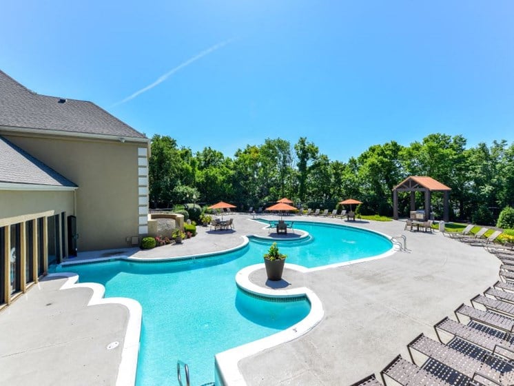 Refreshing Swimming Pool with Relaxing Poolside Lounge Chairs at Hampton Woods, Kansas, 66217