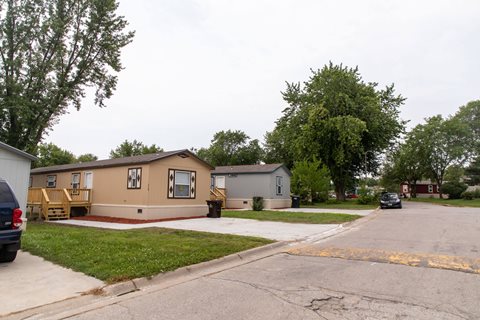 Brown and blue mobile home exteriors at Maple Grove, Lincoln