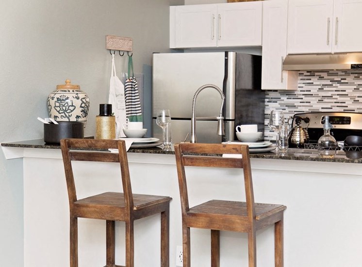 Two bar stools at model home kitchen counter