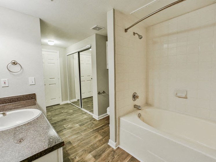 Graves Floorplan, unfurnished bathroom with closet and tub