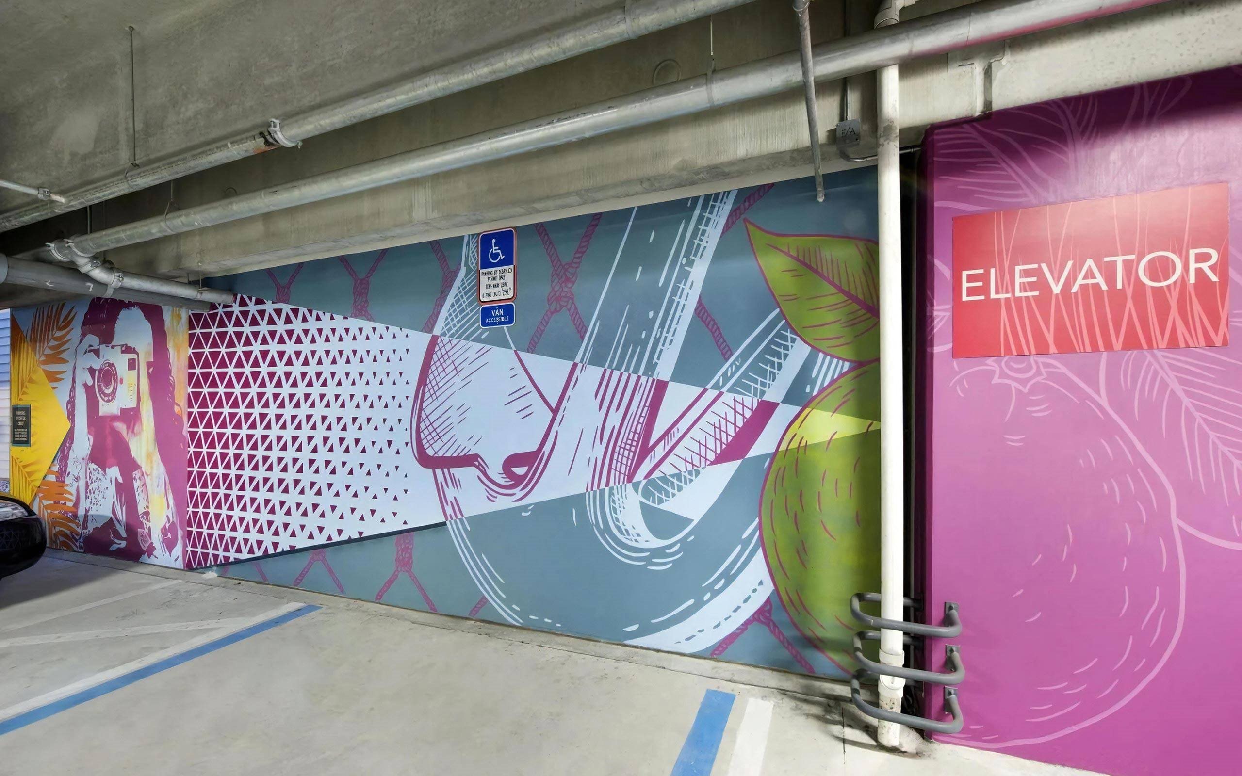 Vibrant Urban Artwork in Anchor Riverwalk Parking Structure Near Elevator Entrance
