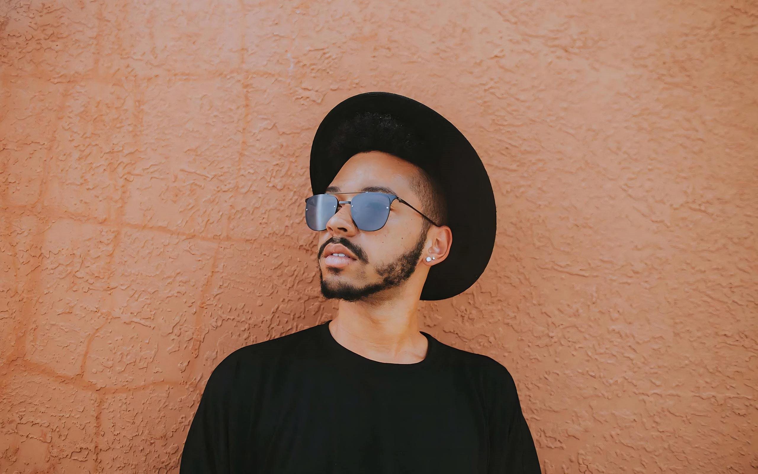 Modern Street Style Portrait with Bold Wall Backdrop