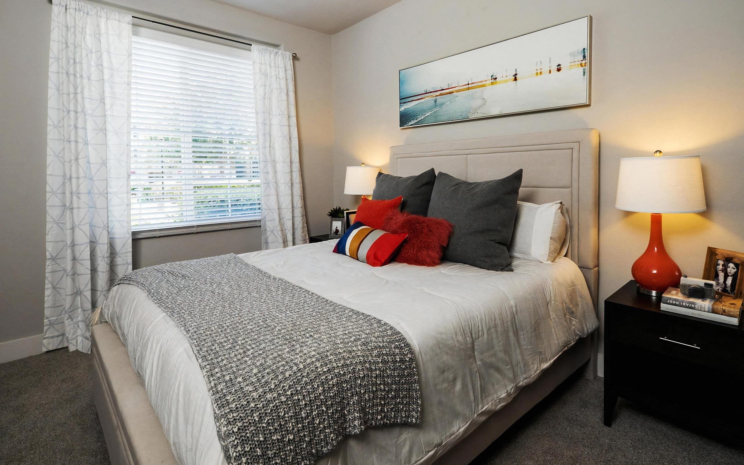 One-Bedroom Interior Featuring Neutral Tones and Modern Lamps