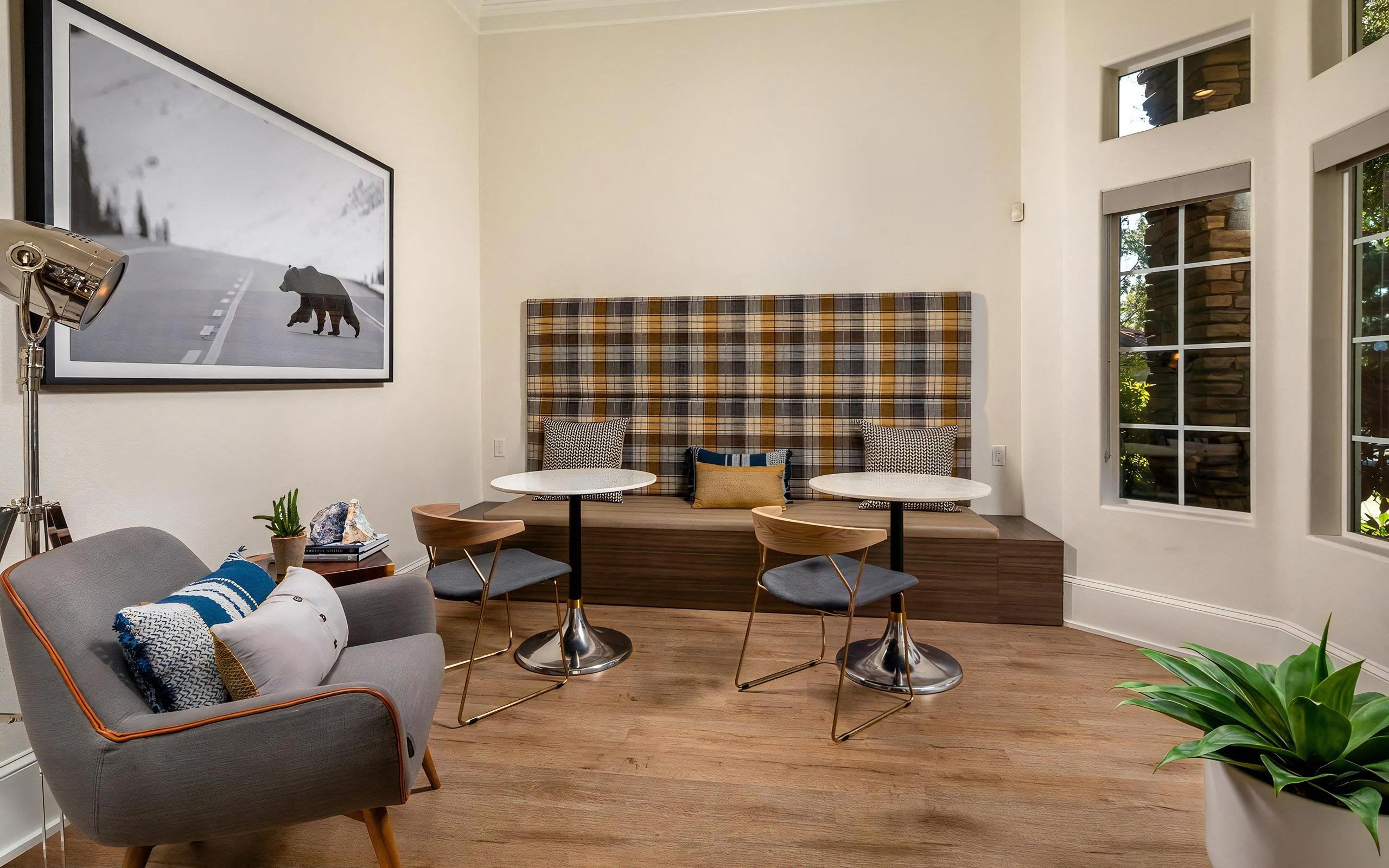 Cozy Clubhouse Lounge with Built-In Banquette Seating and Modern Furnishings