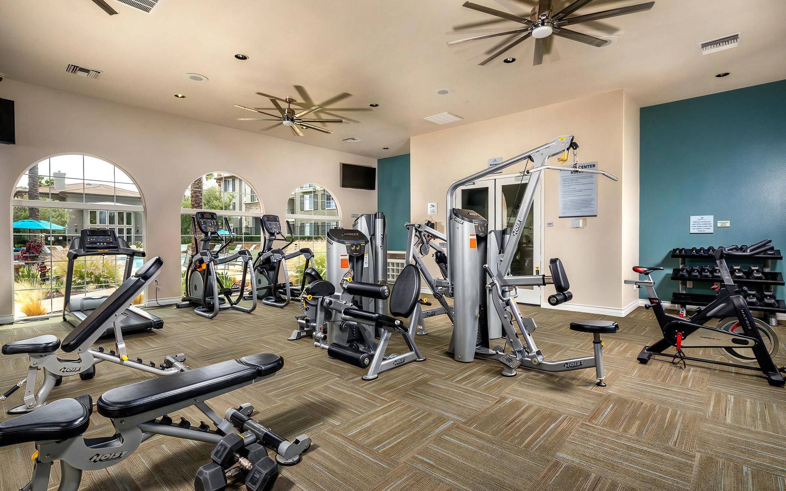 24-Hour Gym Featuring Free Weights, Machines, and Exercise Bikes