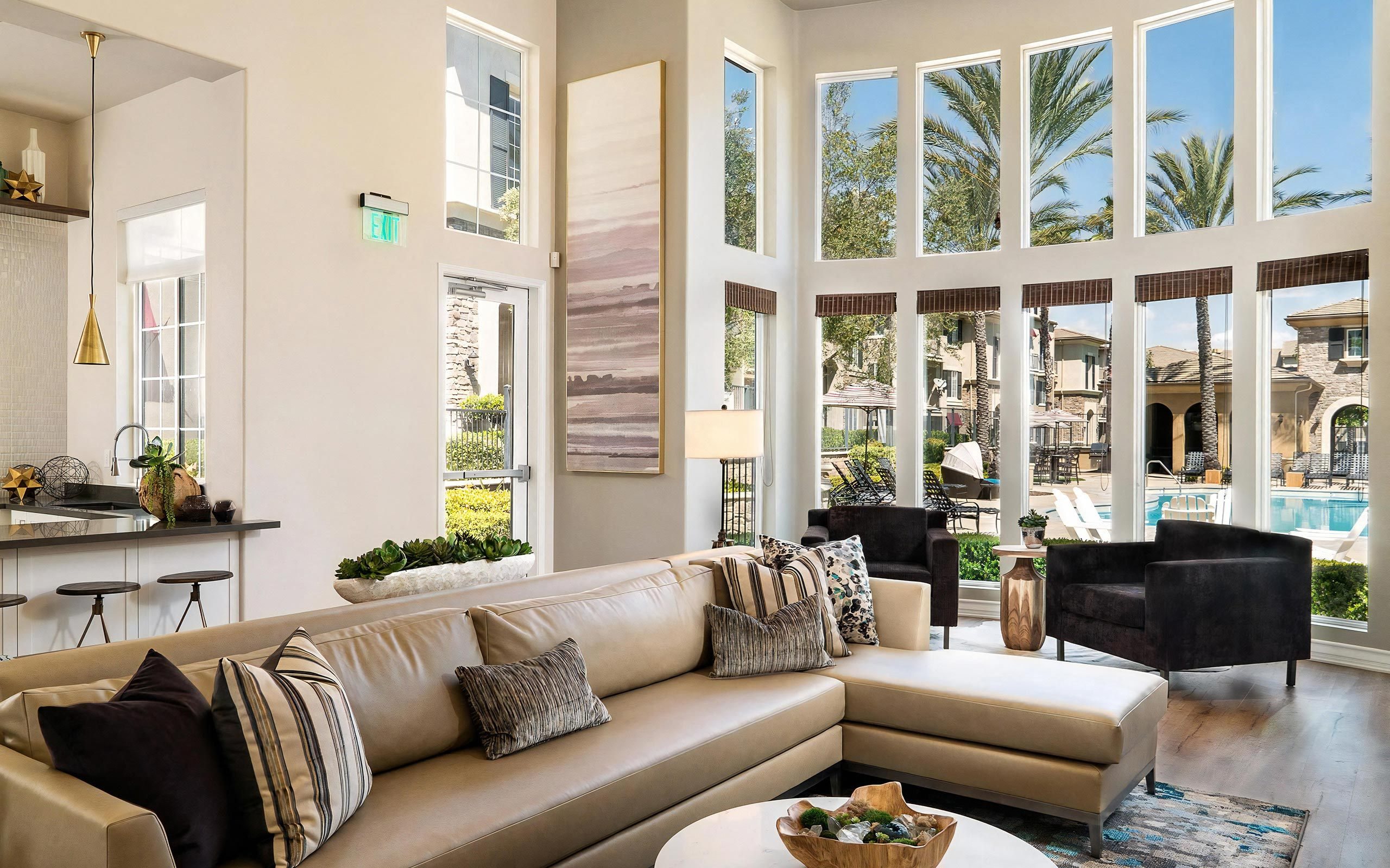 Bright Clubhouse Lounge Featuring Floor-To-Ceiling Windows