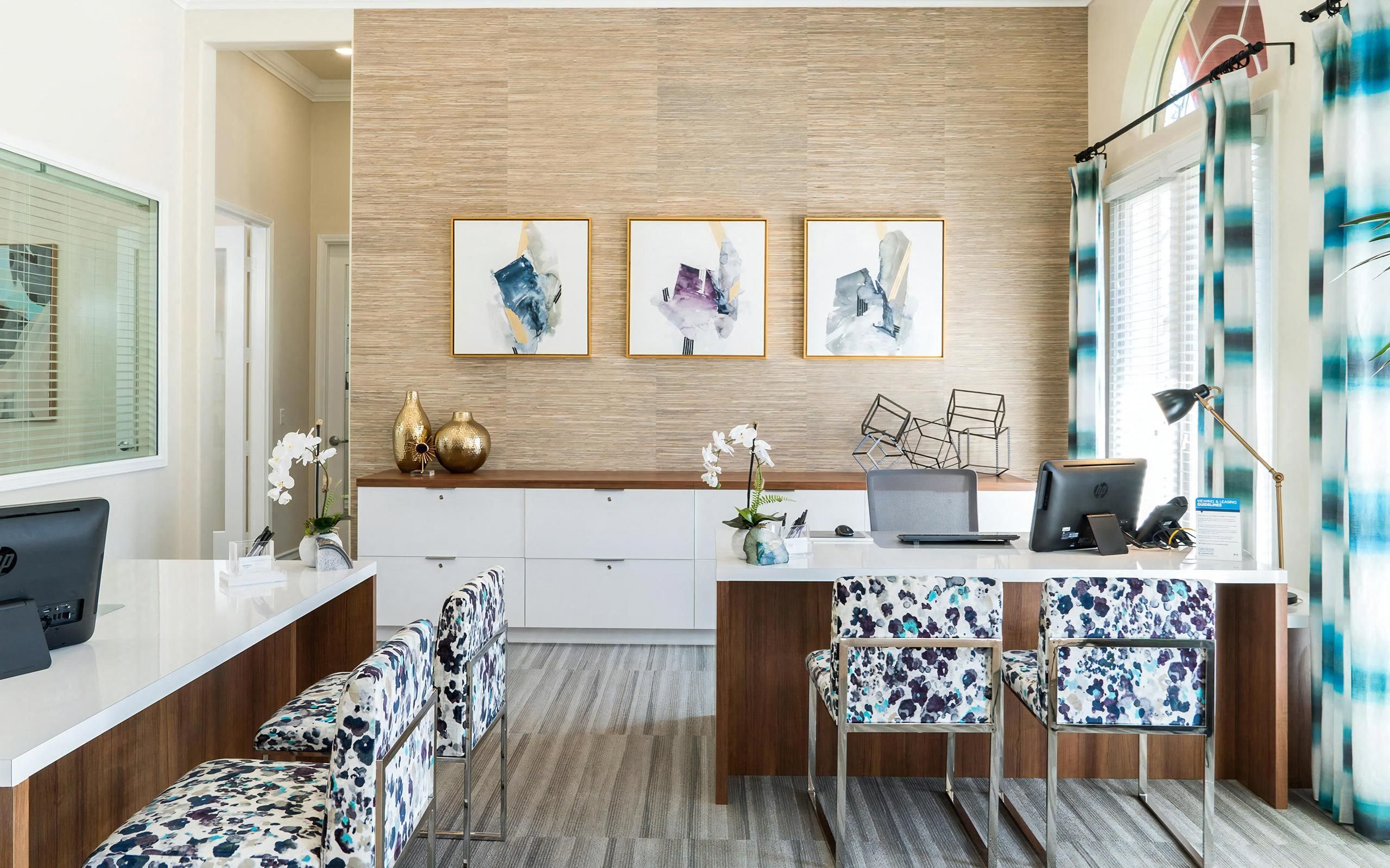 Leasing Center With Coordinated Decor and Private Desks