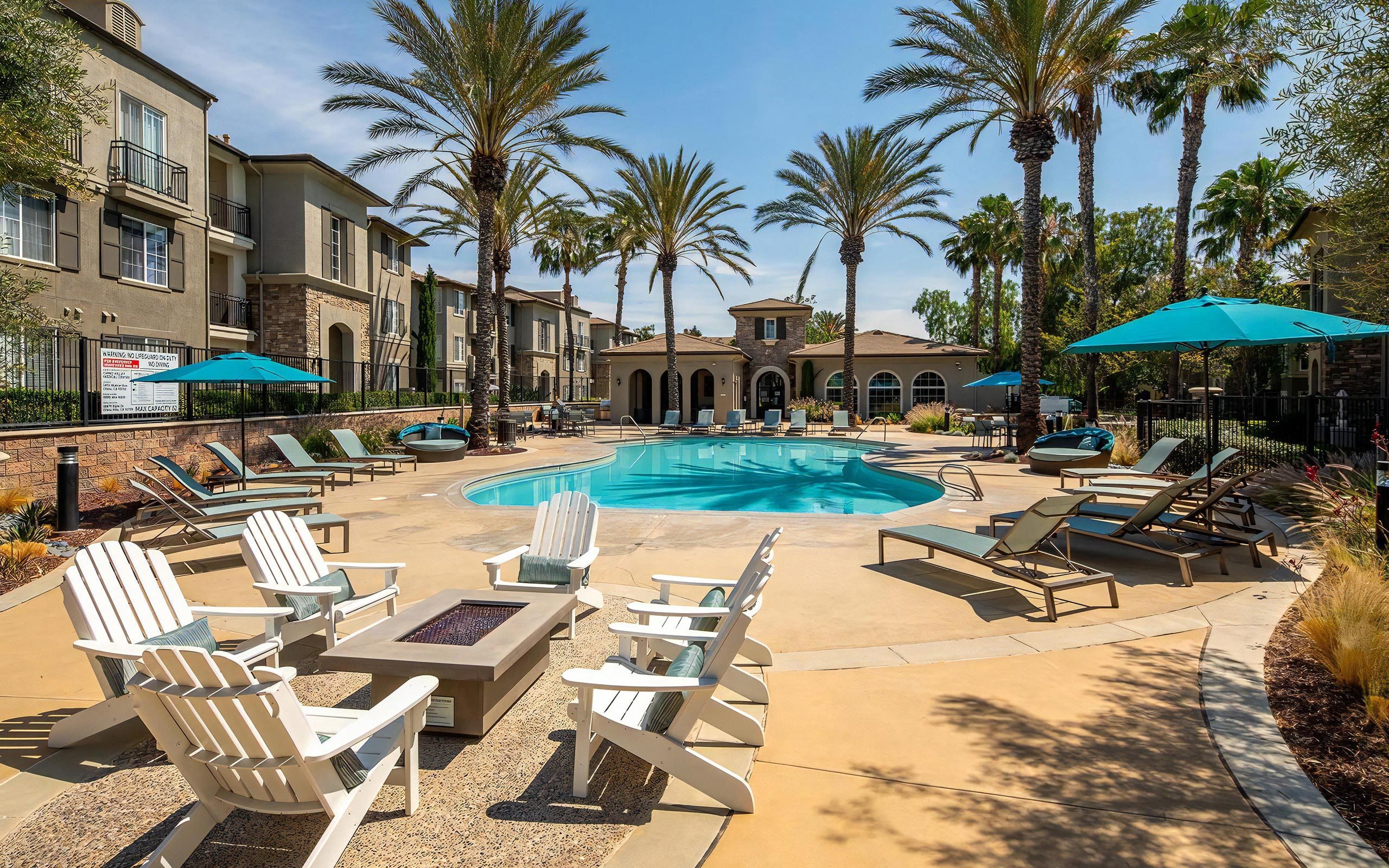 Outdoor Pool Area with Fire Feature and Lounge Seating