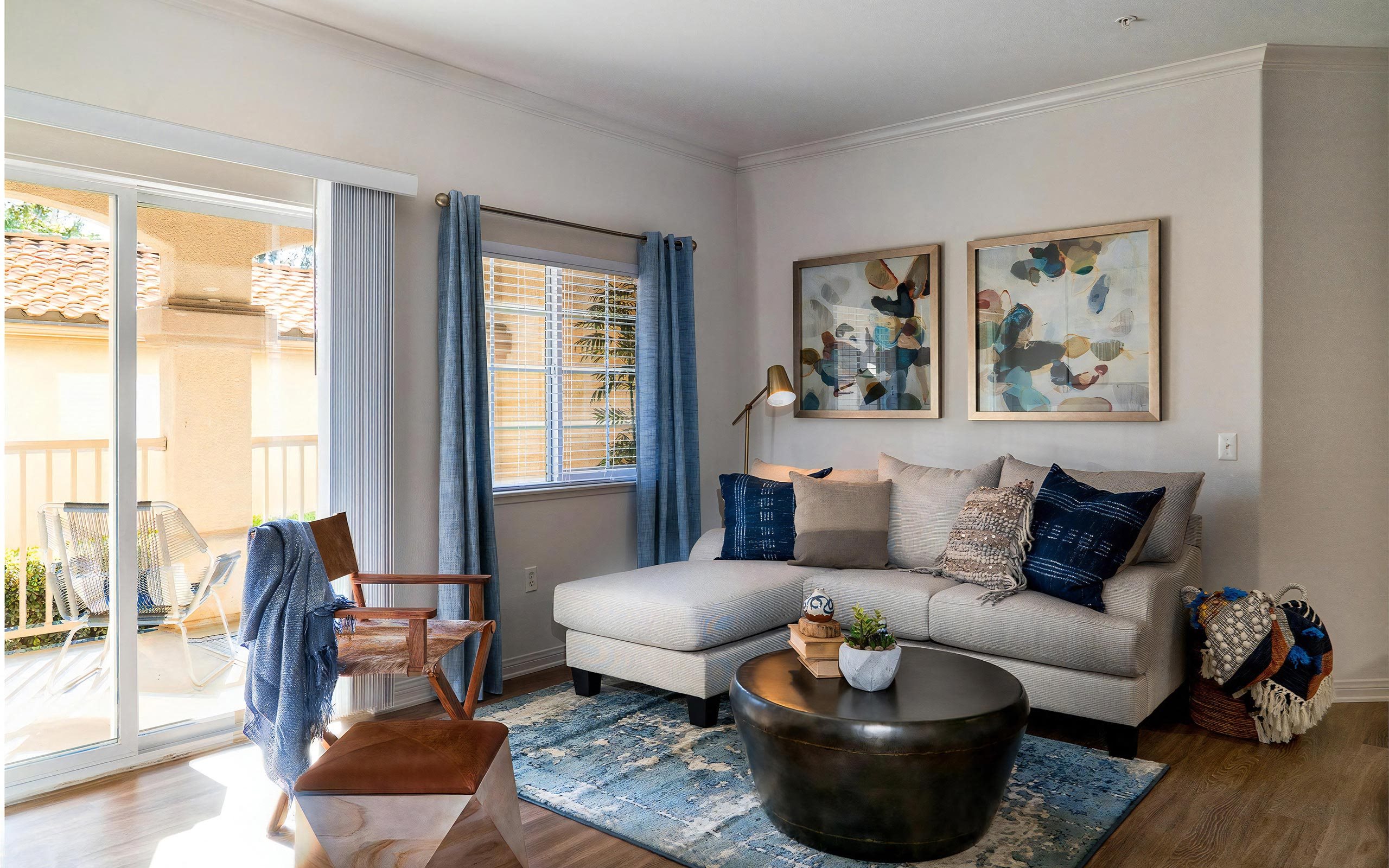 Modern Living Room With Patio Access and Layered Textiles