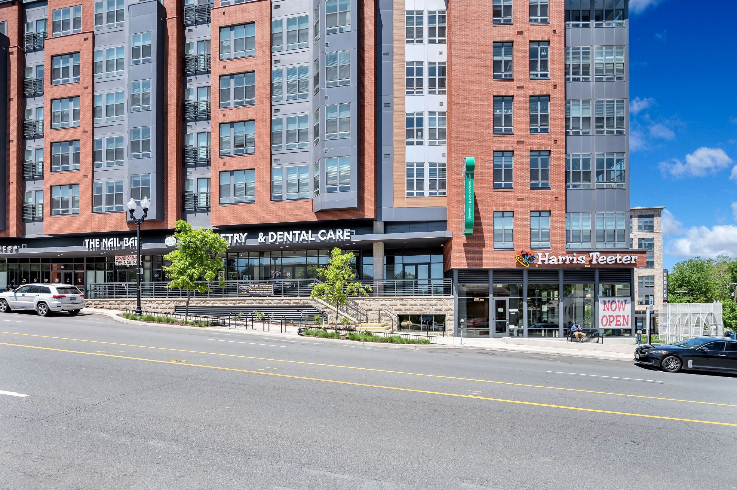 A Harris Teeter store is located in a multi-story building.
