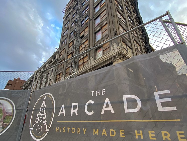 Building exterior with construction banner and logo - The Arts Lofts at Dayton Arcade, Dayton, OH - Kevin Lush Photography