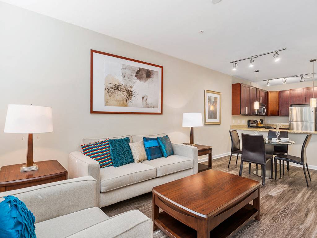Living Room With Kitchen at The Beacon at Waugh Chapel, Gambrills, Maryland