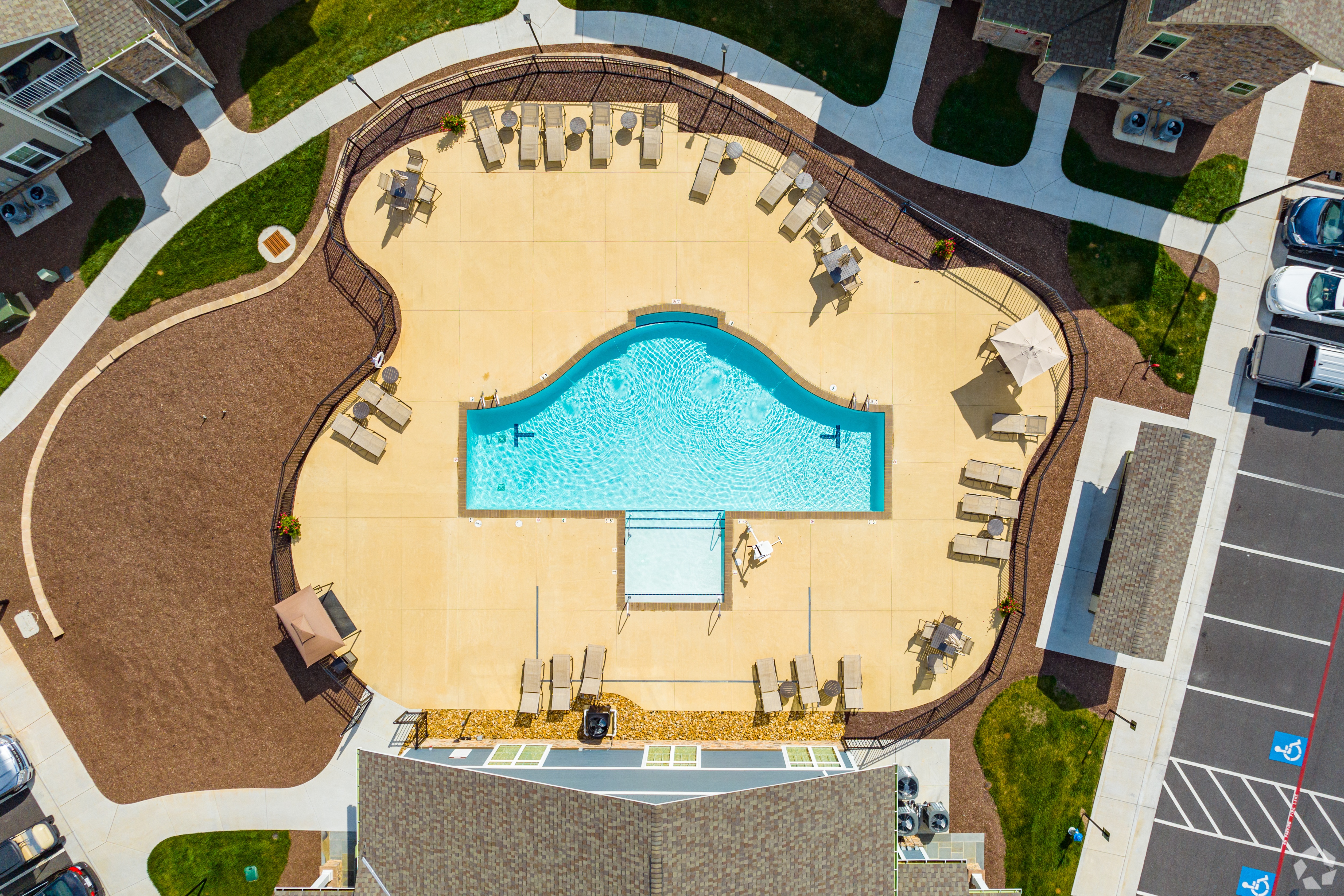 an aerial view of the pool at the resort at longboat key club