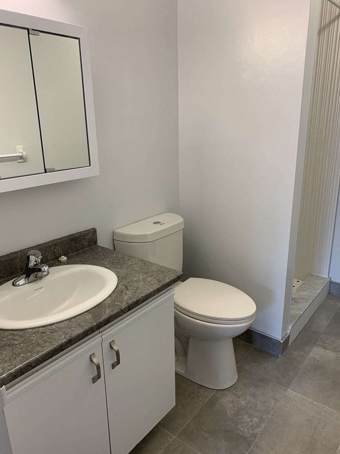 a small bathroom with a toilet and a sink