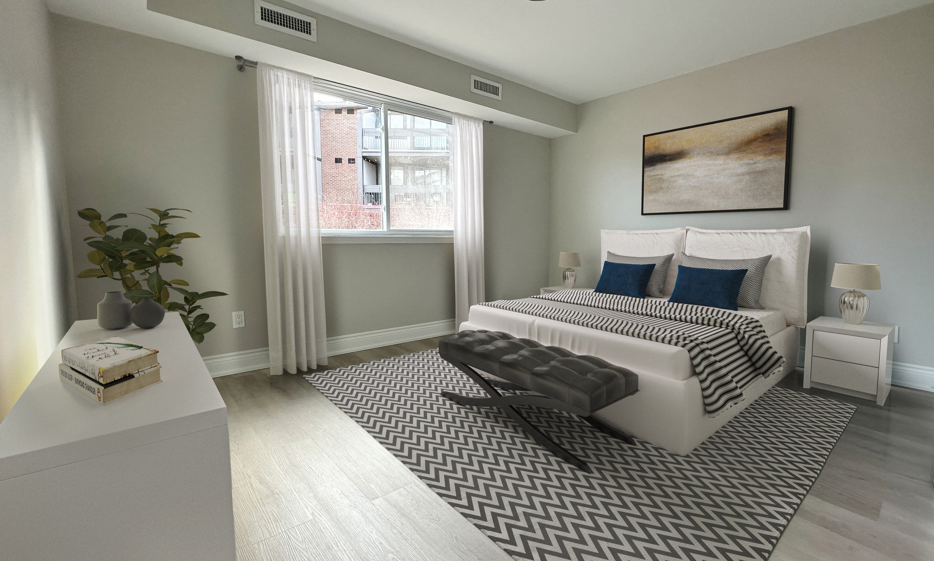 a bedroom with a bed and a large window