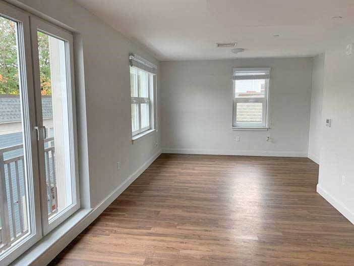Modern plank floor, beautiful glass doors, lots of windows