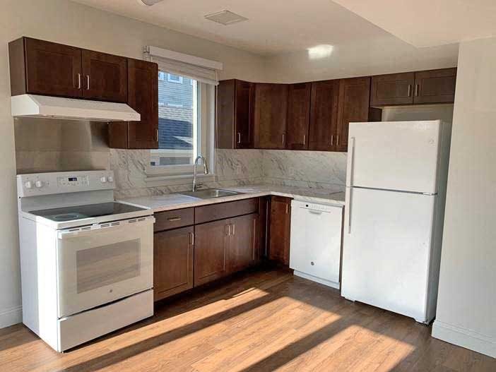 Energy star appliances in nice, bright, open kitchens