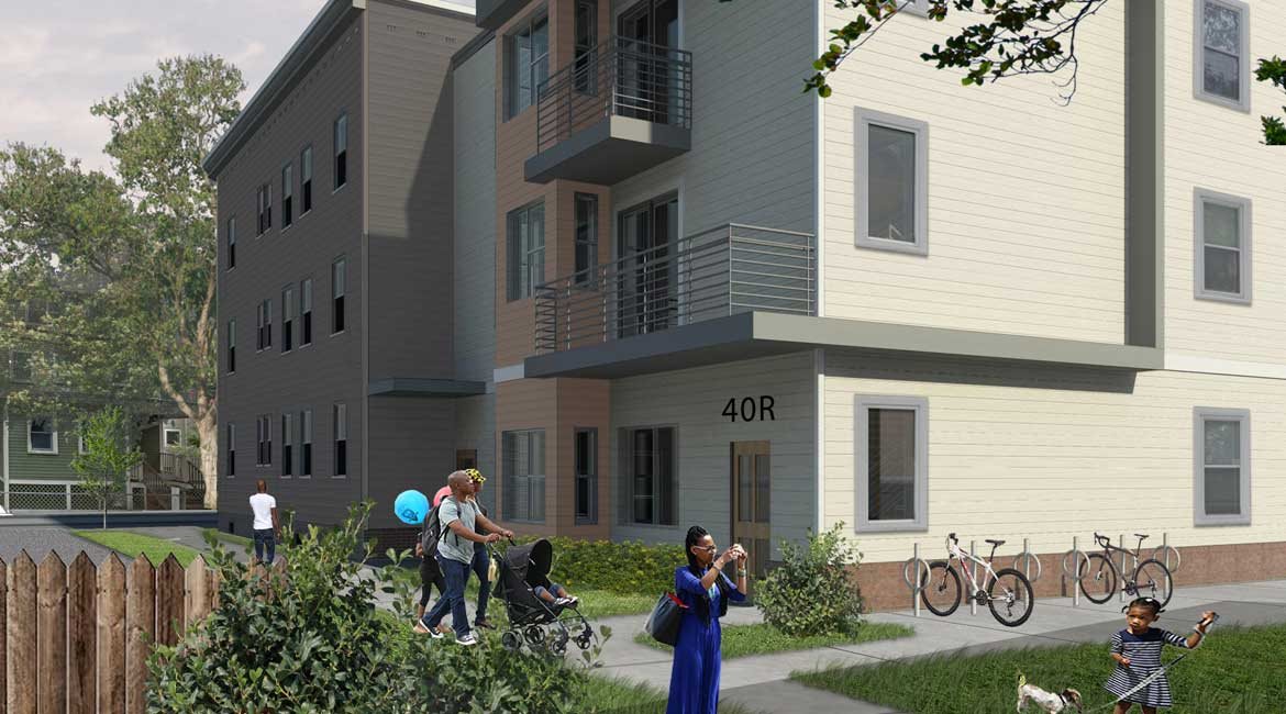 Green outdoor space, units with balconies, diverse community.