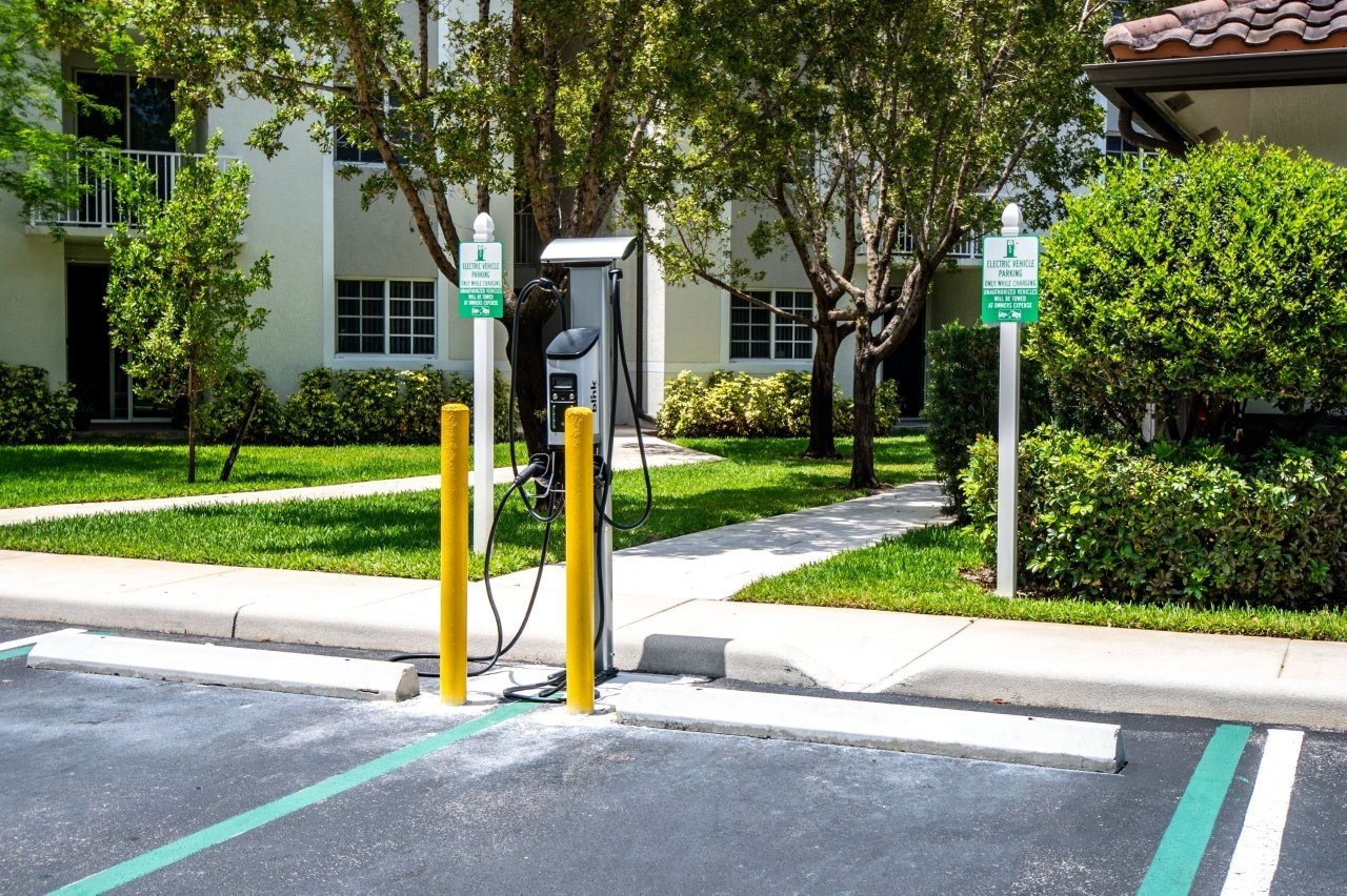 A parking spot with a charging station for electric vehicles.