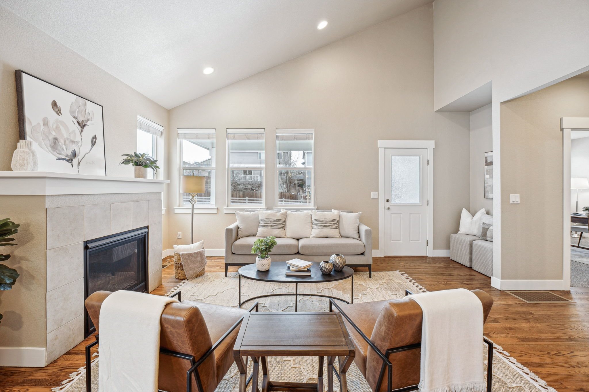 A living room with a fireplace and a couch.