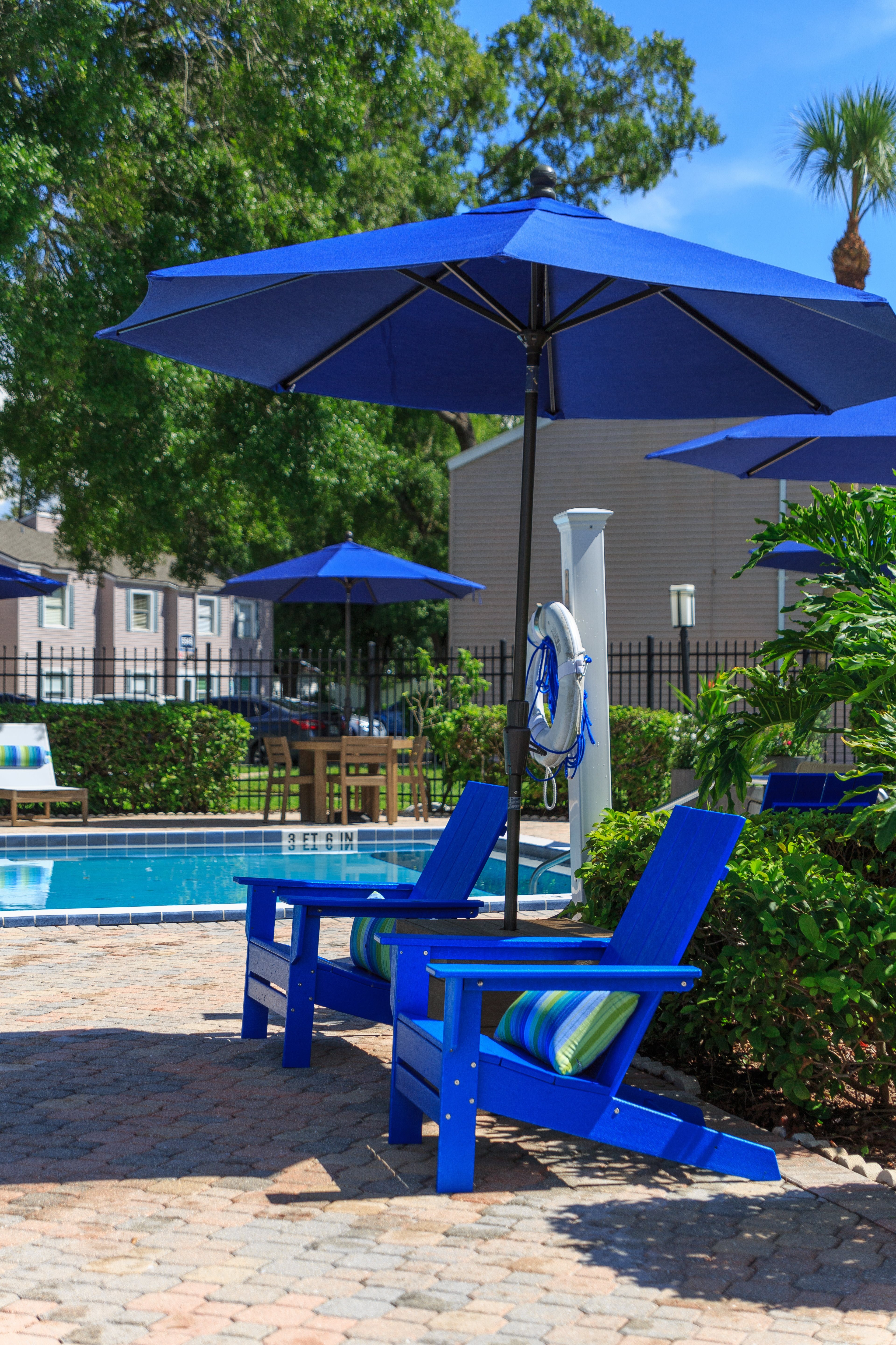 pool lifesaver and chairs