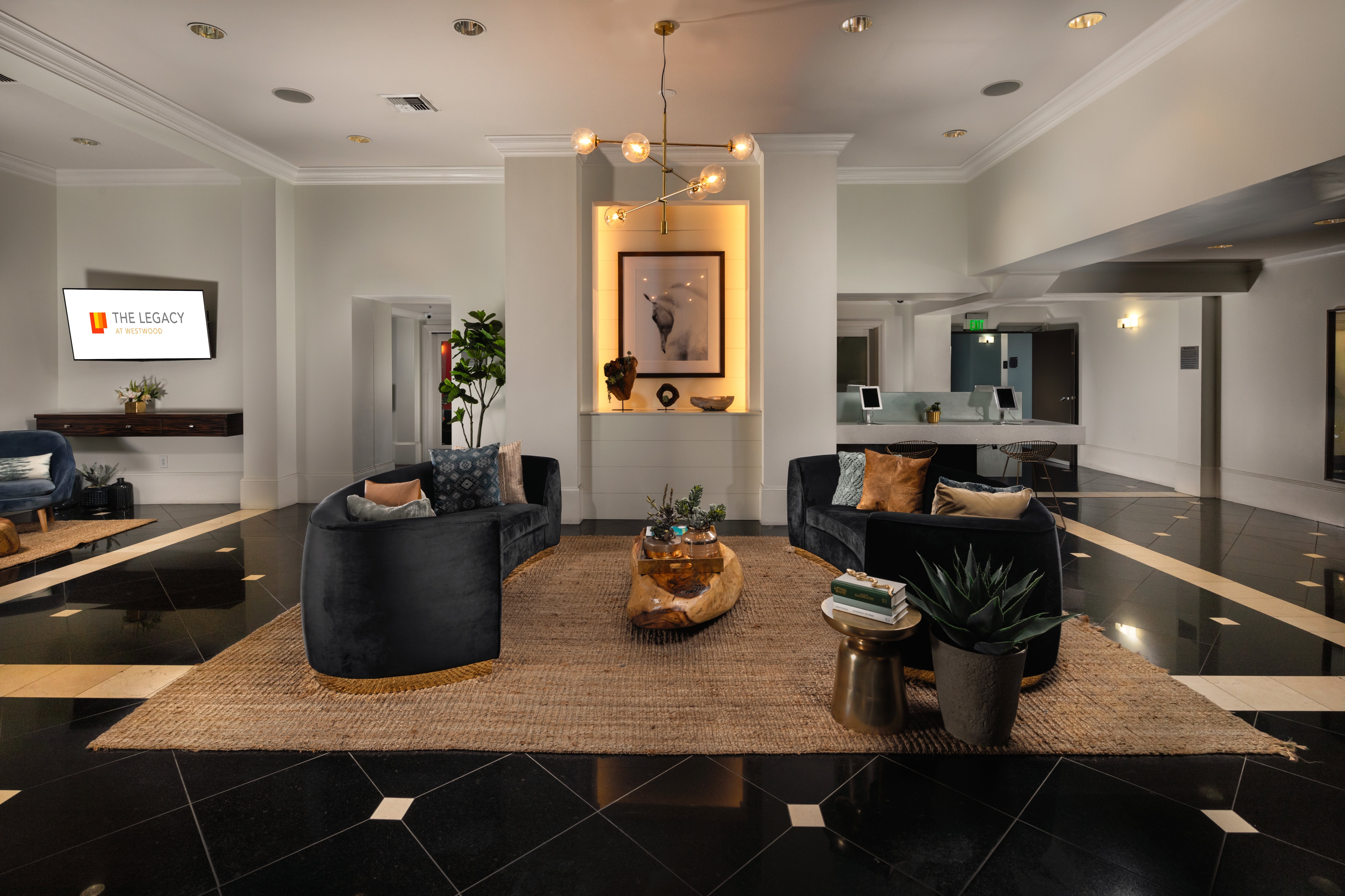 A living room with a black and white checkered floor.