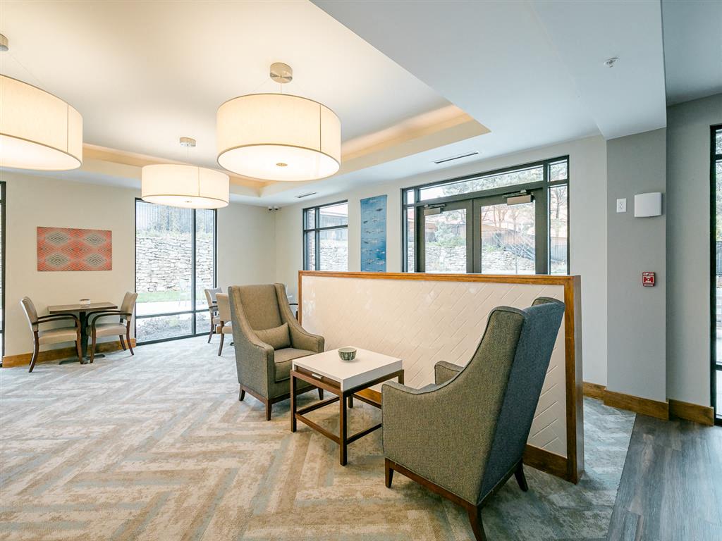 a seating area at residence & conference centre windsor