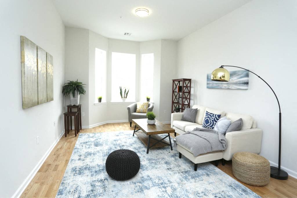 a living room with a couch and a table