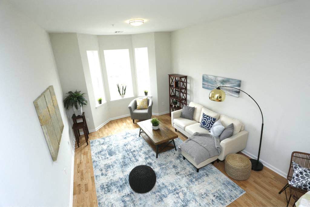 a living room with a couch and a table