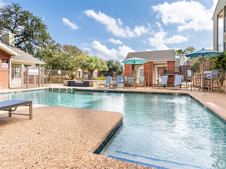 Refreshing Pool With Large Sundeck And Wi-Fi at Wildwood Apartments, CLEAR Property Management, Austin, Texas