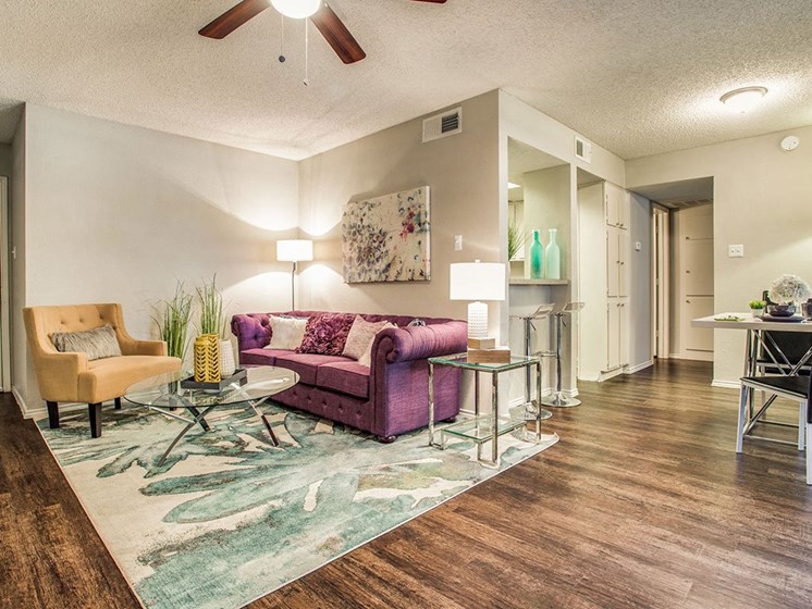 Living Room With Dining Area at Newport Apartments, CLEAR Property Management, Irving, TX