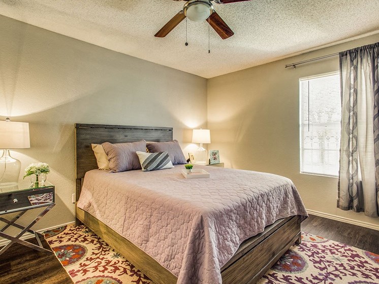 Bedroom With Expansive Windows at Newport Apartments, CLEAR Property Management, Irving, TX