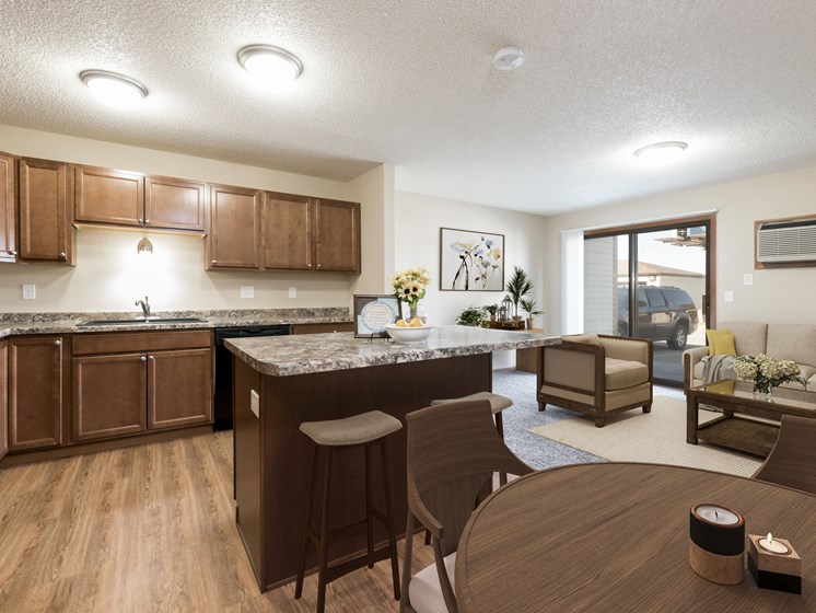 Bismarck, ND Fairview a combined dining and living area with dark wood cabinets and furnishings. The space features a dining table, chairs, and comfortable seating for the living room. It offers a versatile and inviting area for dining, relaxation, and socializing with family and friends