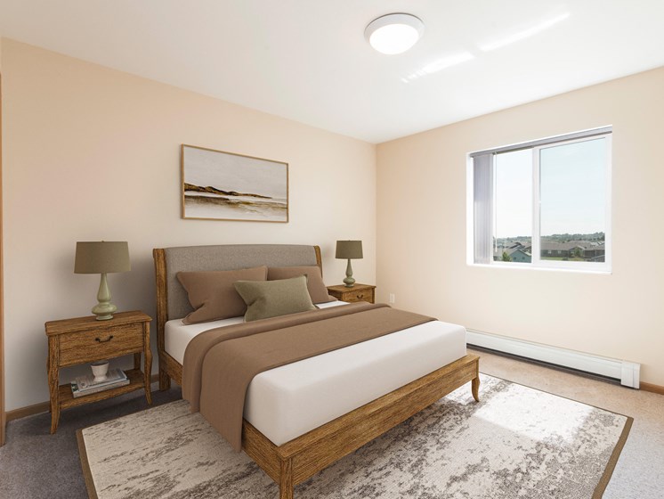 Bismarck, ND Sunset Ridge Apartments. A bedroom with a bed and two nightstands. A window brightens the room with natural light.