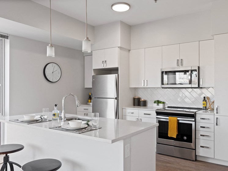 Gourmet Kitchen With Island at 23rd Place Apartments, Chicago, IL