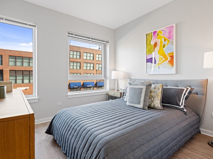 Bedroom With Expansive Windows at 23rd Place Apartments, Chicago, 60616