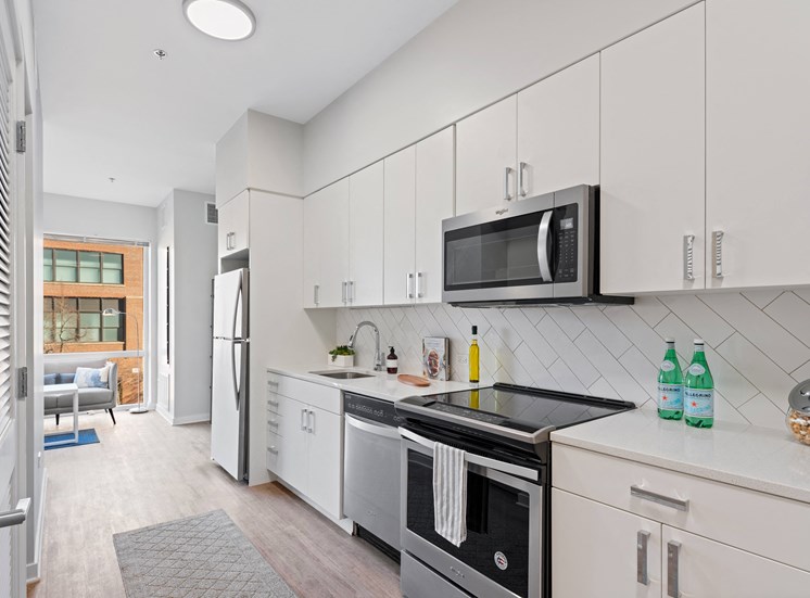 Galley kitchen with stainless steel appliances at Chicago apartments for rent