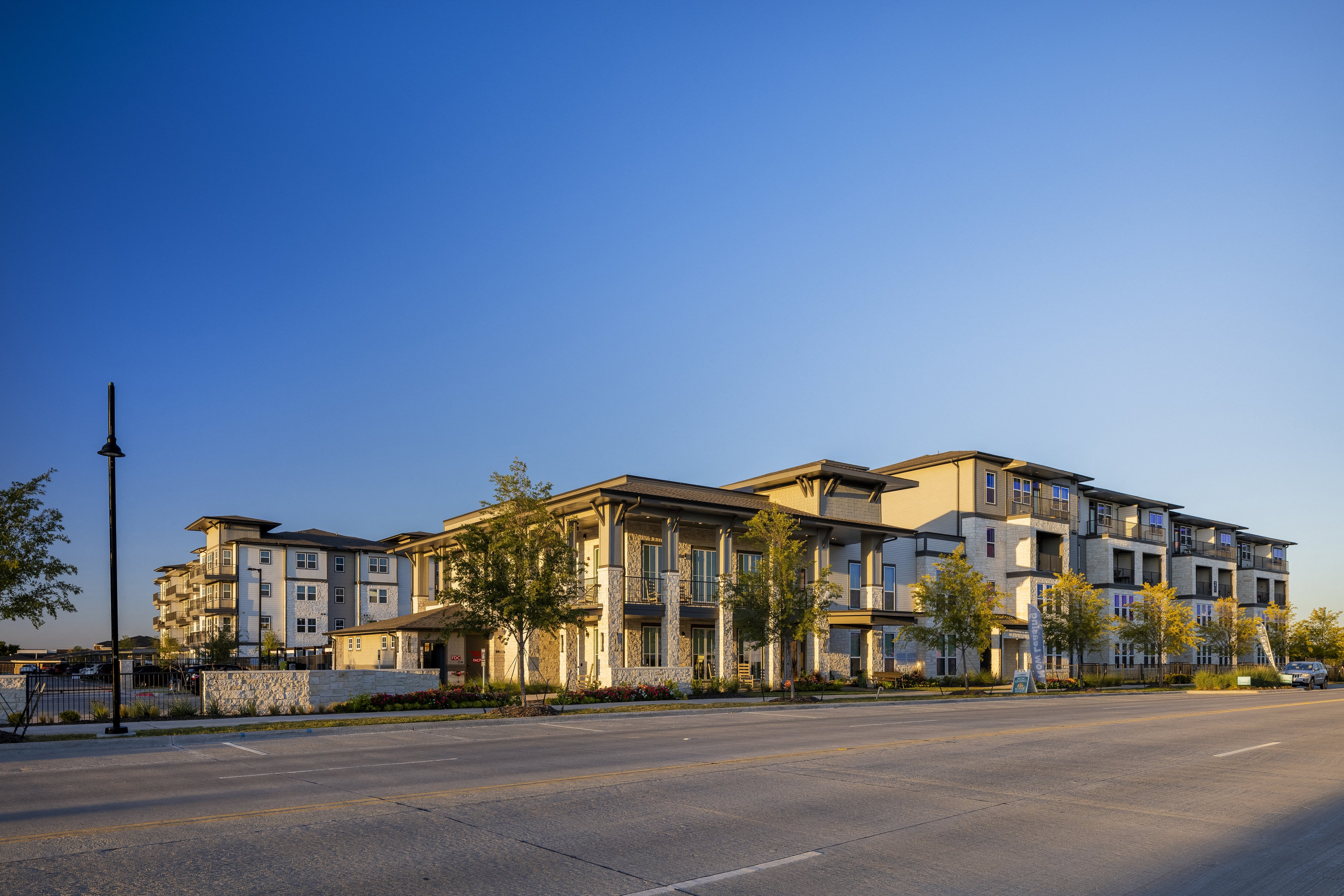 a street view of a senior apartment community