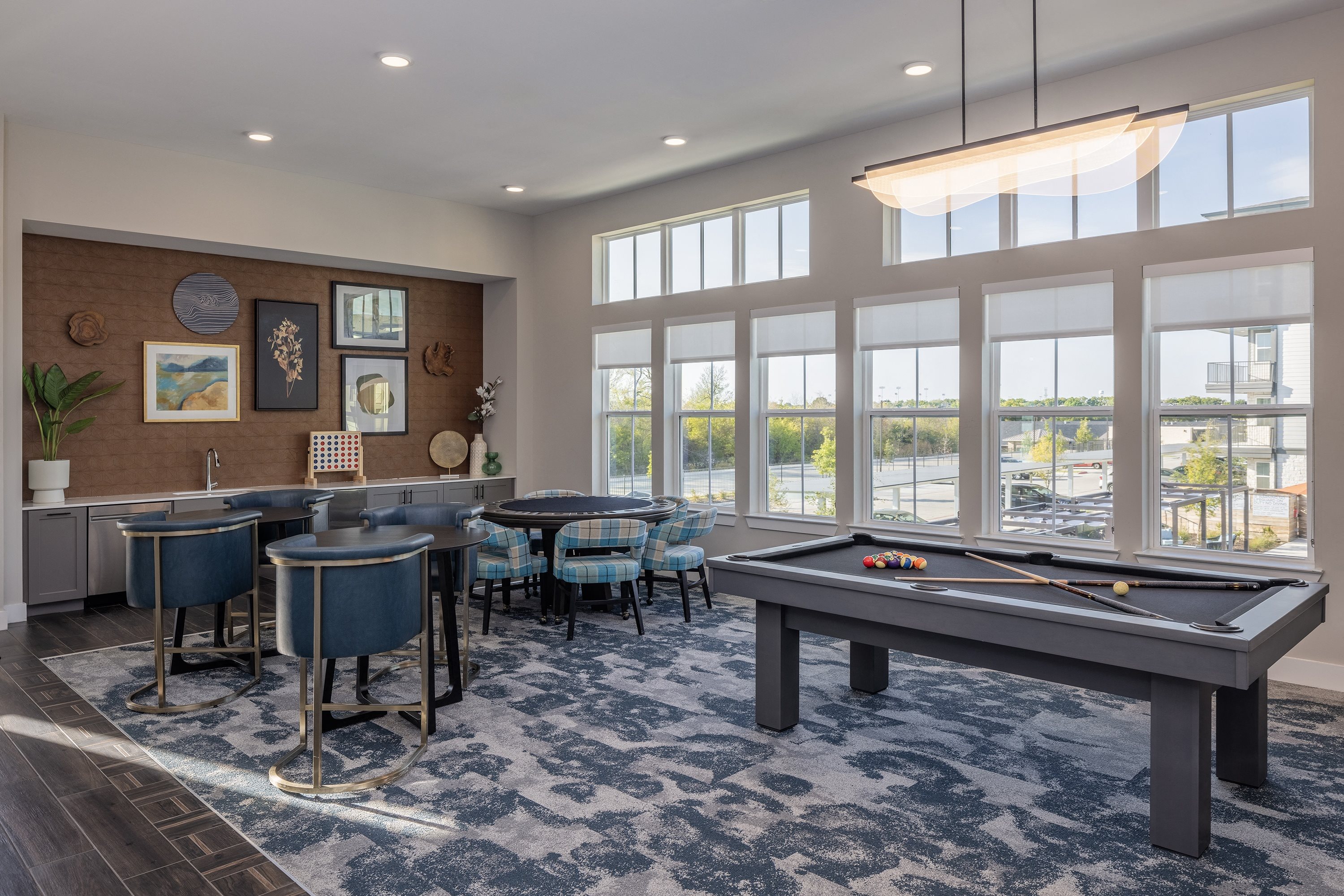 a game room with a pool table and