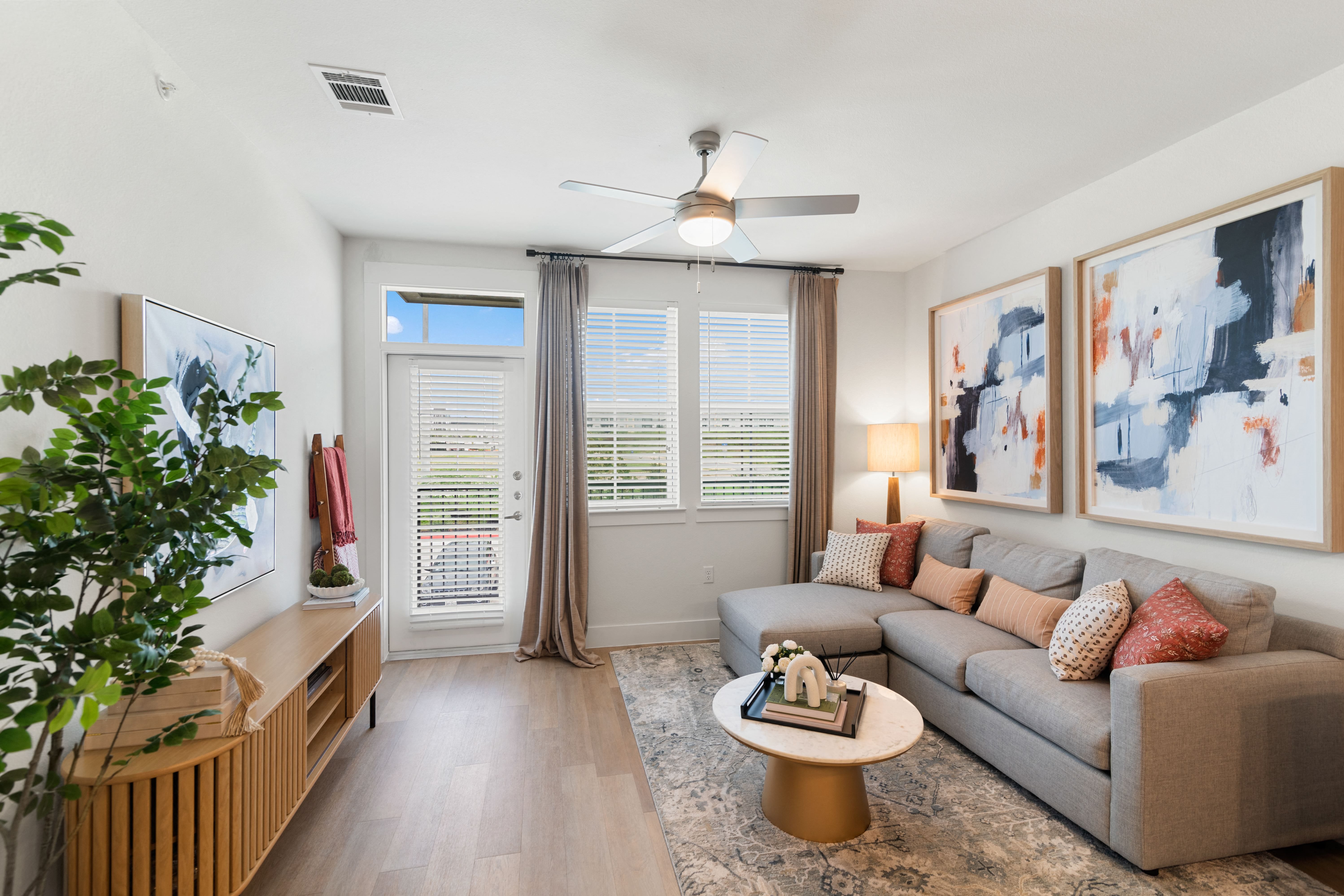 an open living room with a couch and a coffee table