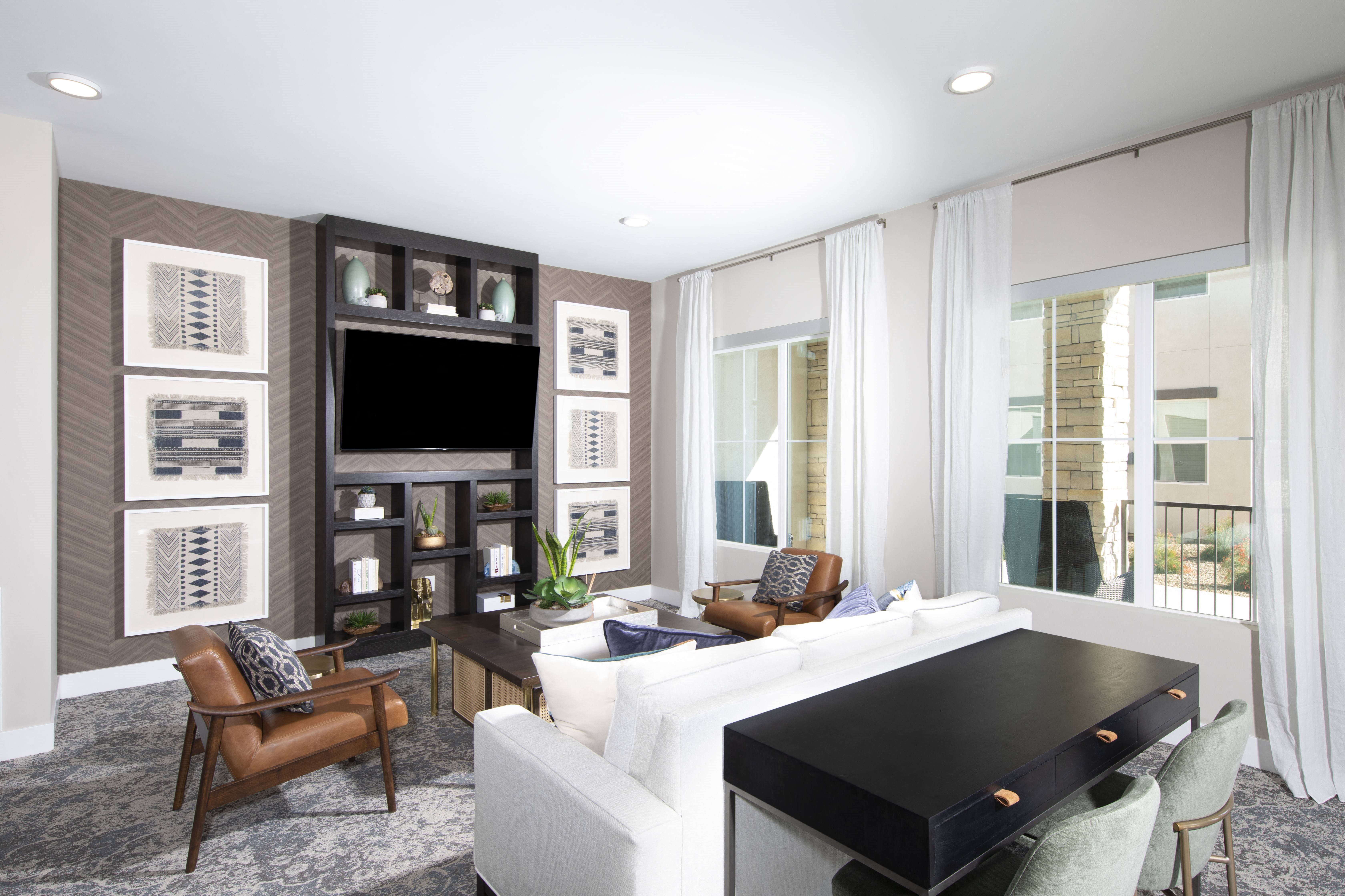 a communal clubhouse lounge area at a senior apartment community