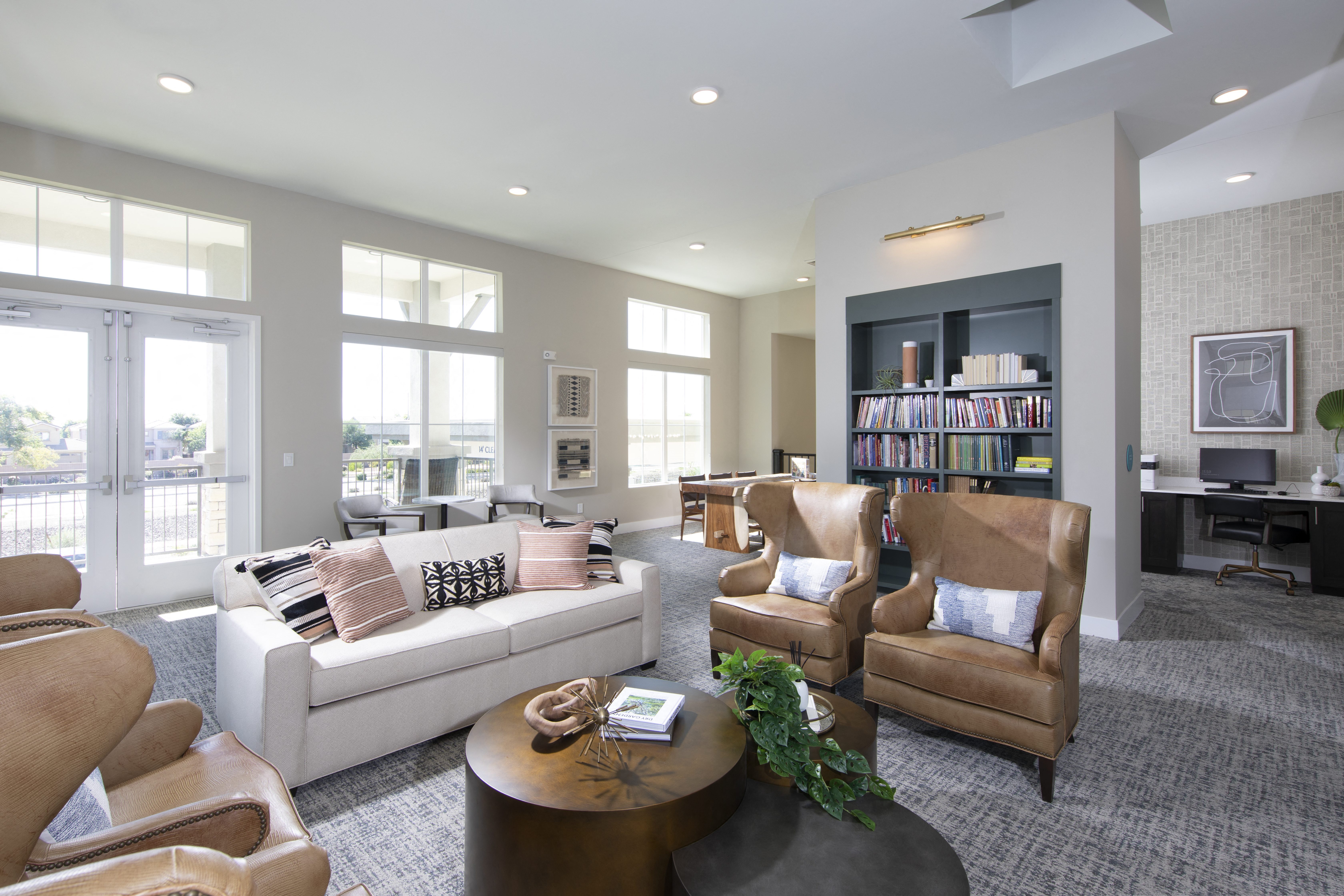 a communal clubhouse lounge area at a senior apartment community
