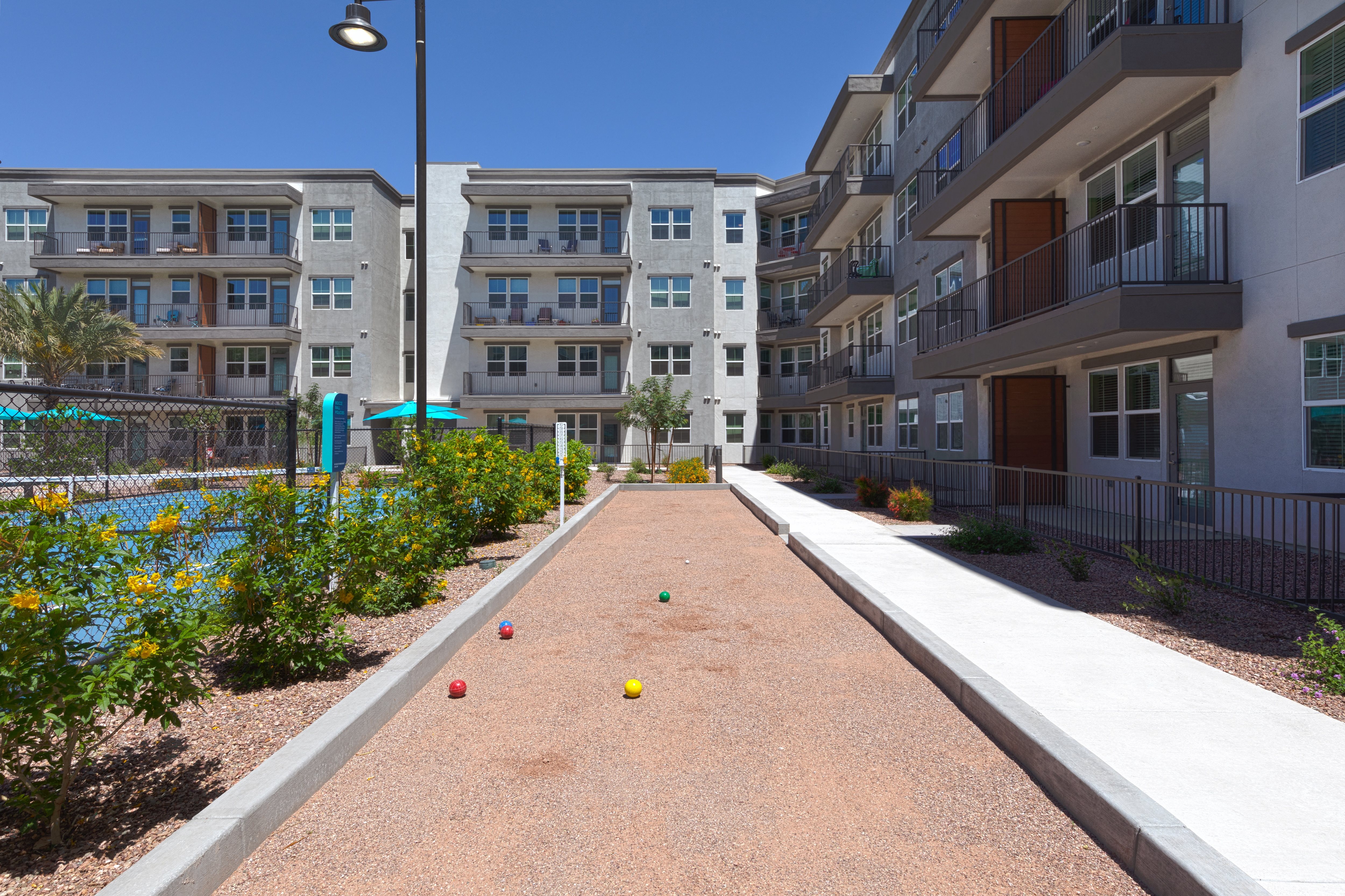 a bocce ball court at a senior apartment community