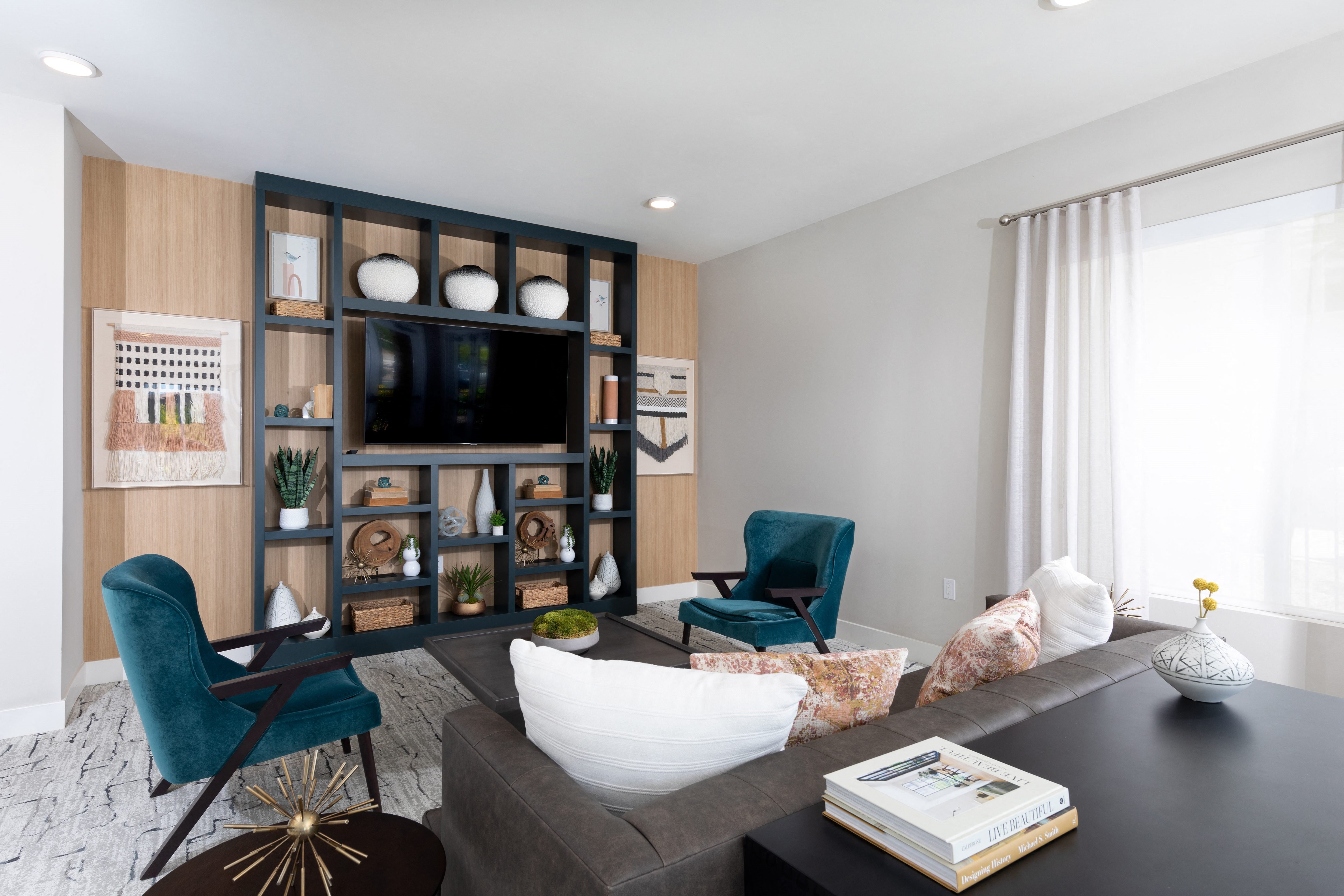 a communal clubhouse lounge area at a senior apartment community