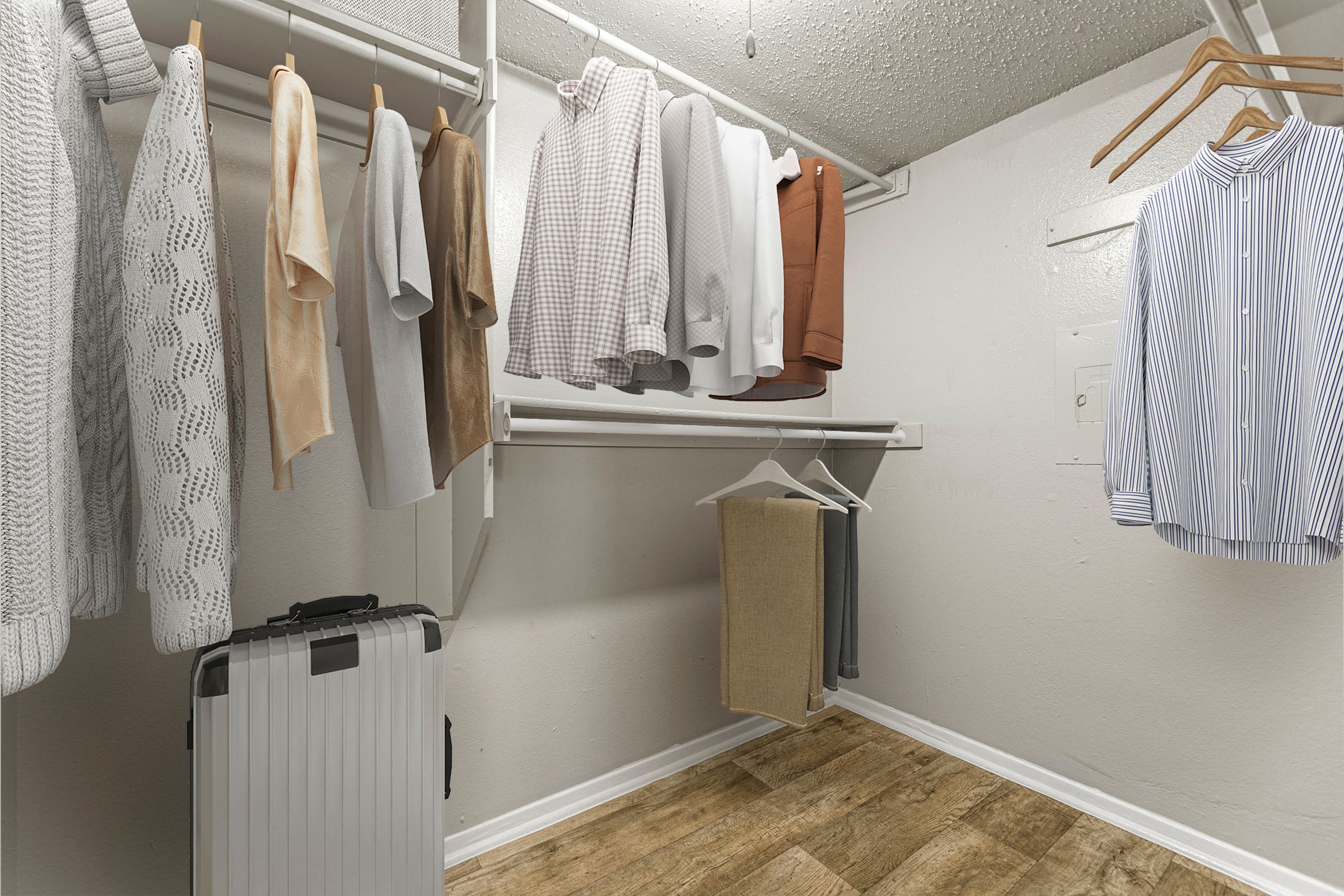 clothes hanging on a rack at 5636 Apartment Homes, Dallas, TX, 75254