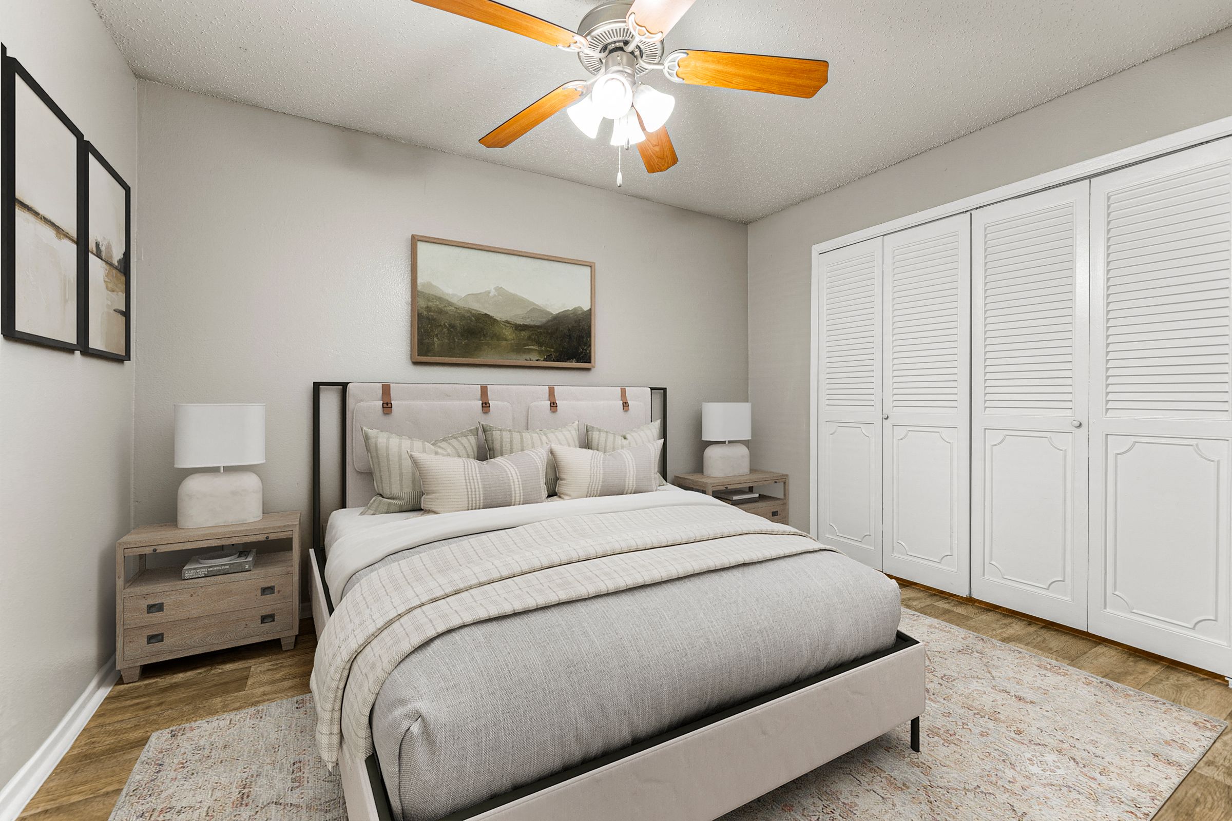a bedroom with a bed and a ceiling fan at 5636 Apartment Homes, Dallas, TX  75254